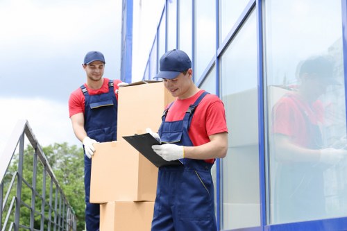 House removals planning in Vauxhall with moving boxes and packed furniture