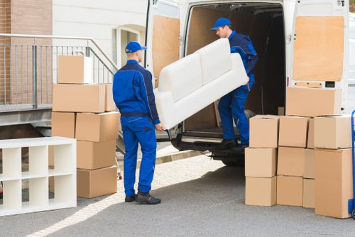 Local removal van service navigating a London street