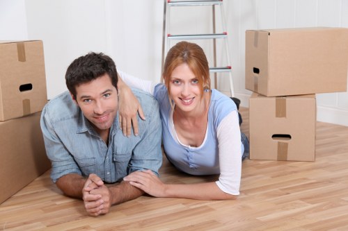 Packed boxes and furniture loaded into a removal van