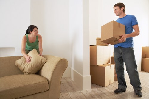 Man and van team navigating stairs during a Vauxhall apartment removal
